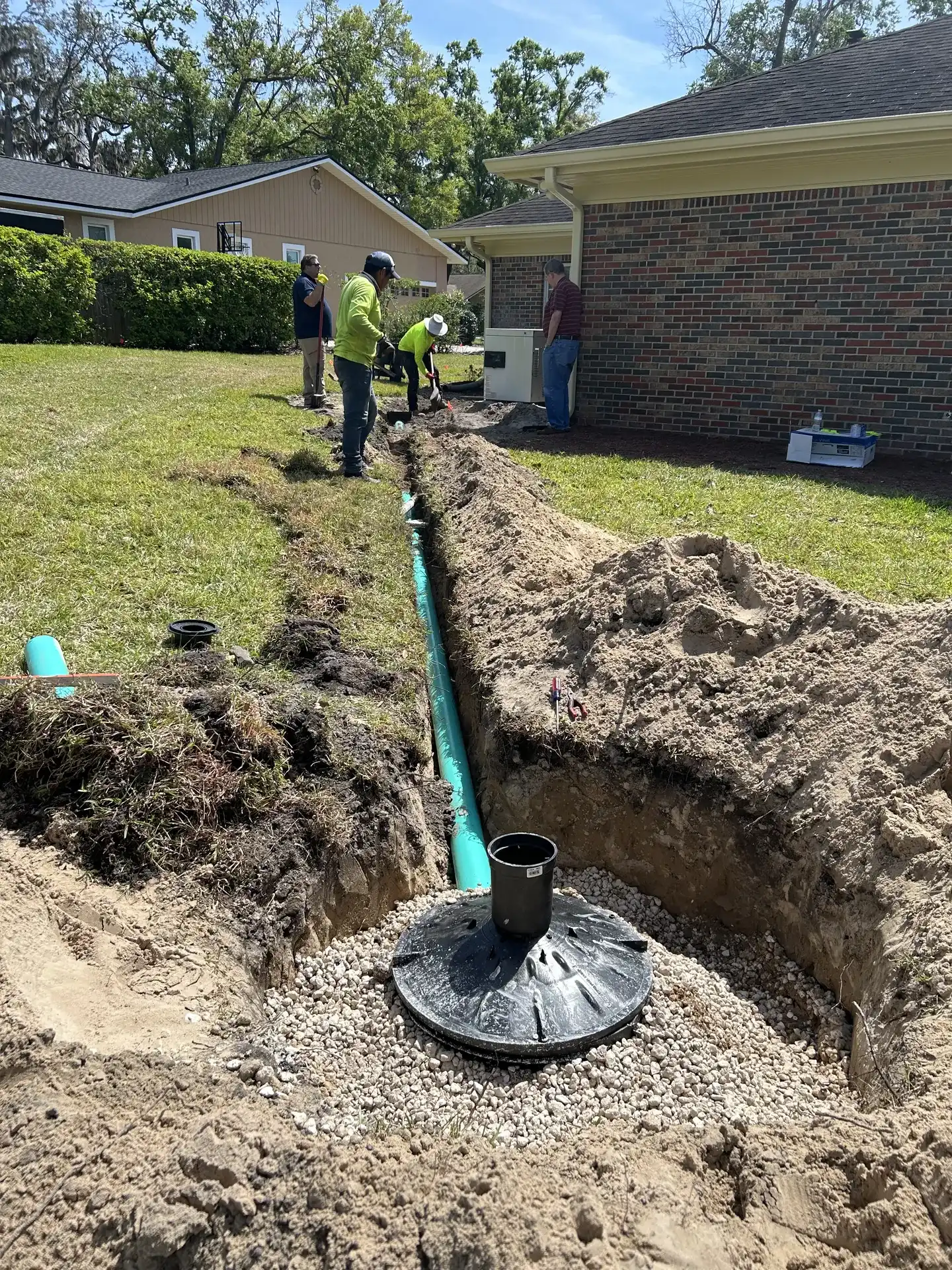 French drain and catch basin installed by Tampa Turf Services